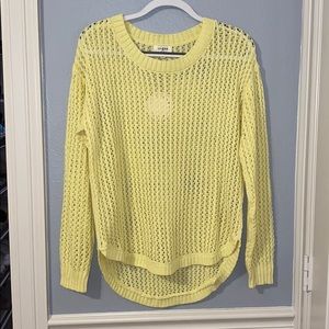 yellow pullover sweater